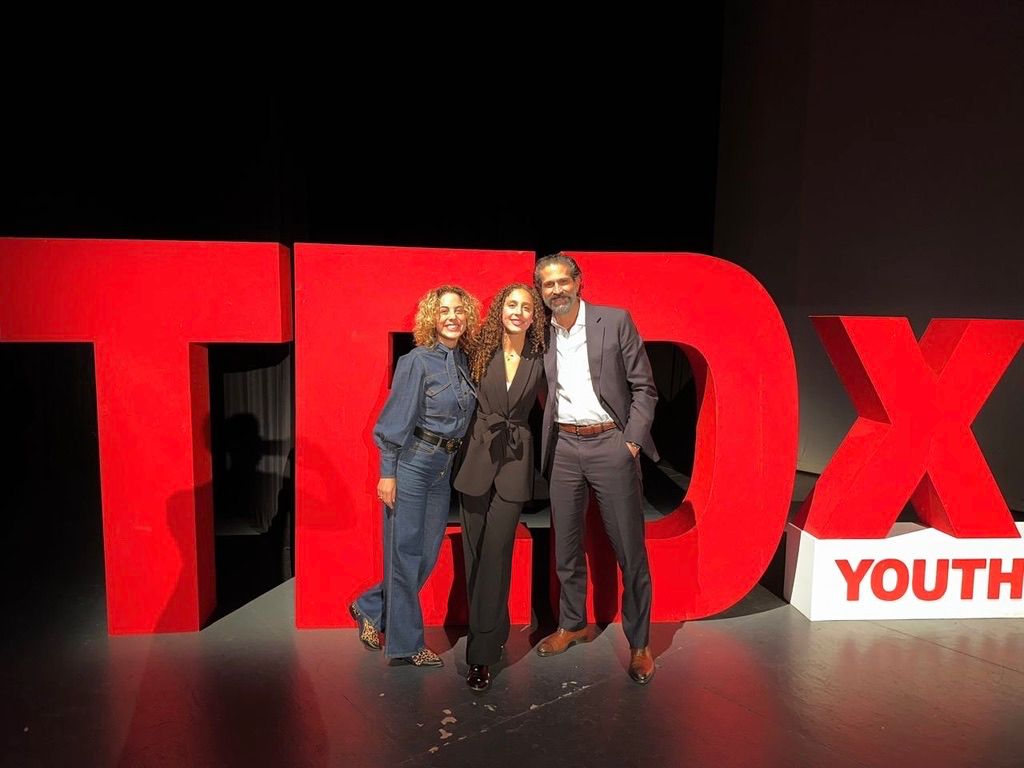 Group of people celebrating on stage