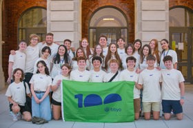 Group of people celebrating on stage