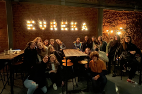 Group of people celebrating on stage