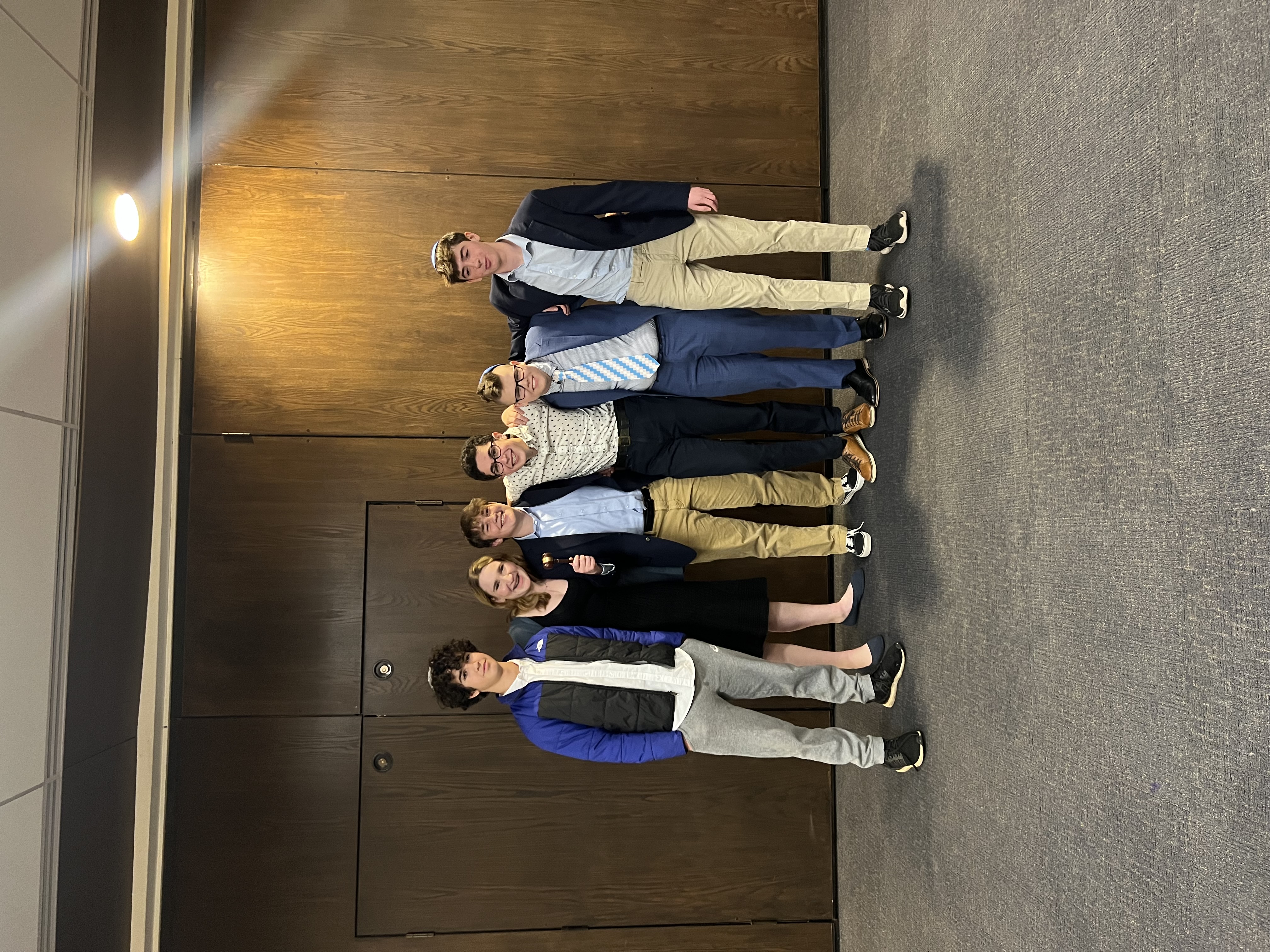 Group of people celebrating on stage