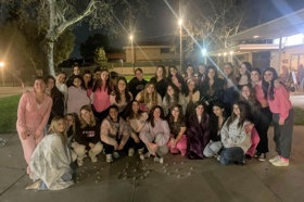 Group of people celebrating on stage