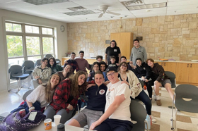 Group of people celebrating on stage