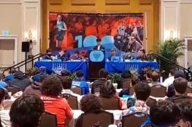 Group of people celebrating on stage