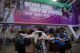 Group of people celebrating on stage