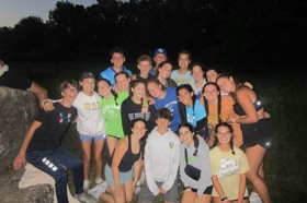 Group of people celebrating on stage