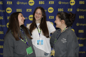 Group of people celebrating on stage