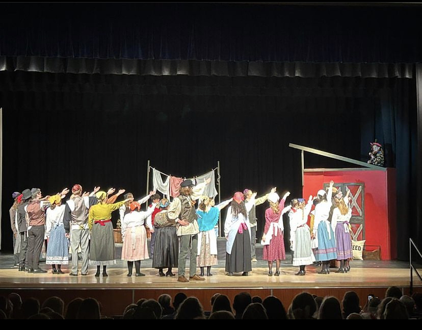 Group of people celebrating on stage