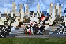 Group of people celebrating on stage