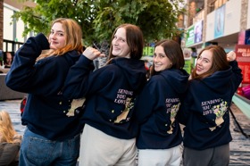 Group of people celebrating on stage