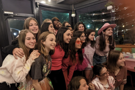 Group of people celebrating on stage