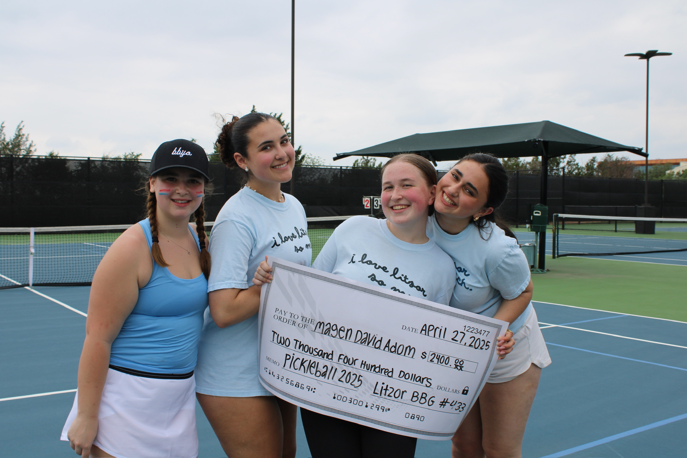 Group of people celebrating on stage