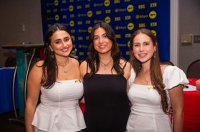 Group of people celebrating on stage