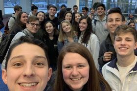 Group of people celebrating on stage