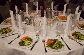 Group of people celebrating on stage