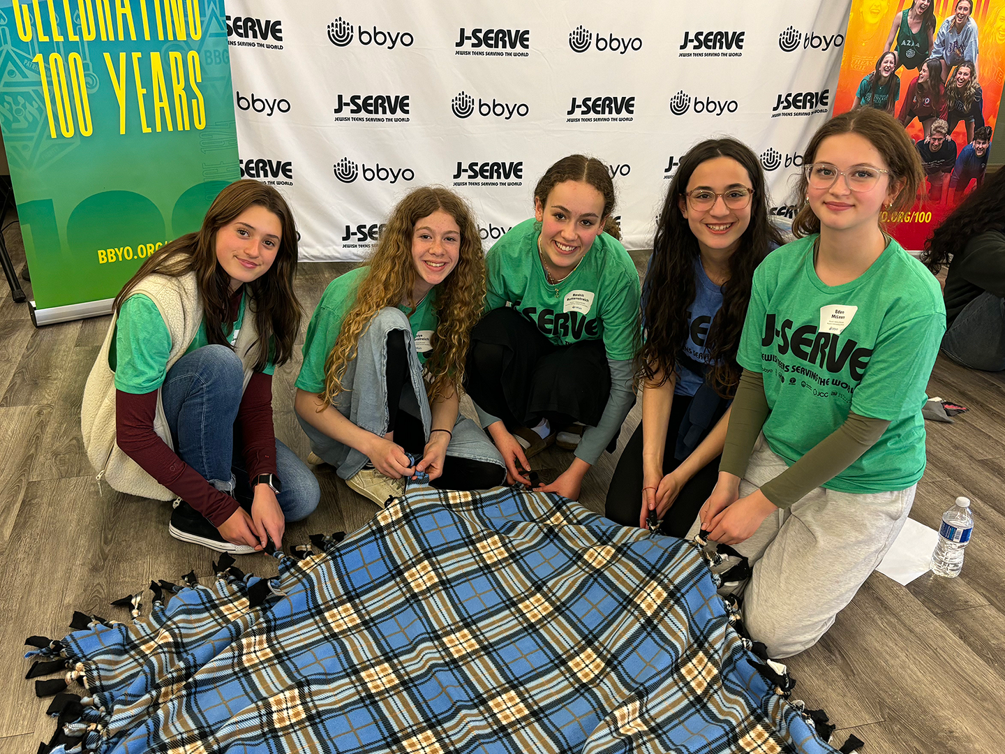 Group of people celebrating on stage