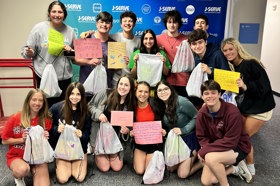 Group of people celebrating on stage