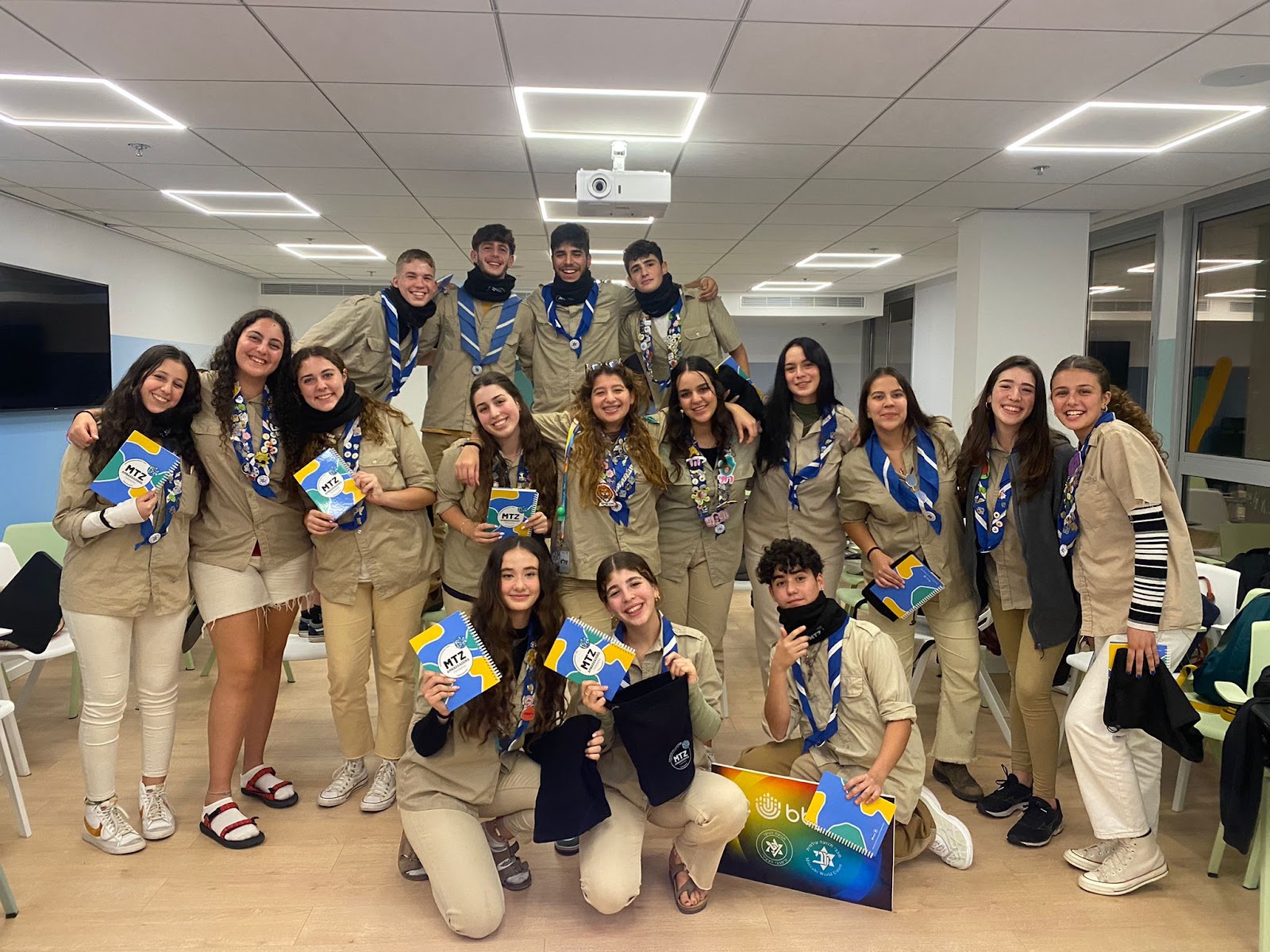 Group of people celebrating on stage