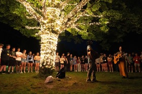 Group of people celebrating on stage