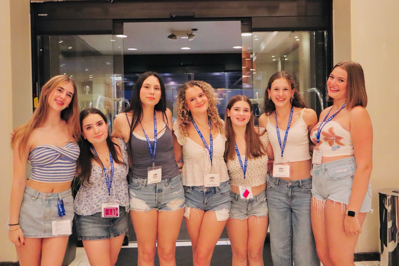 Group of people celebrating on stage