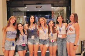 Group of people celebrating on stage