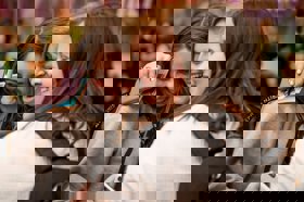 Group of people celebrating on stage