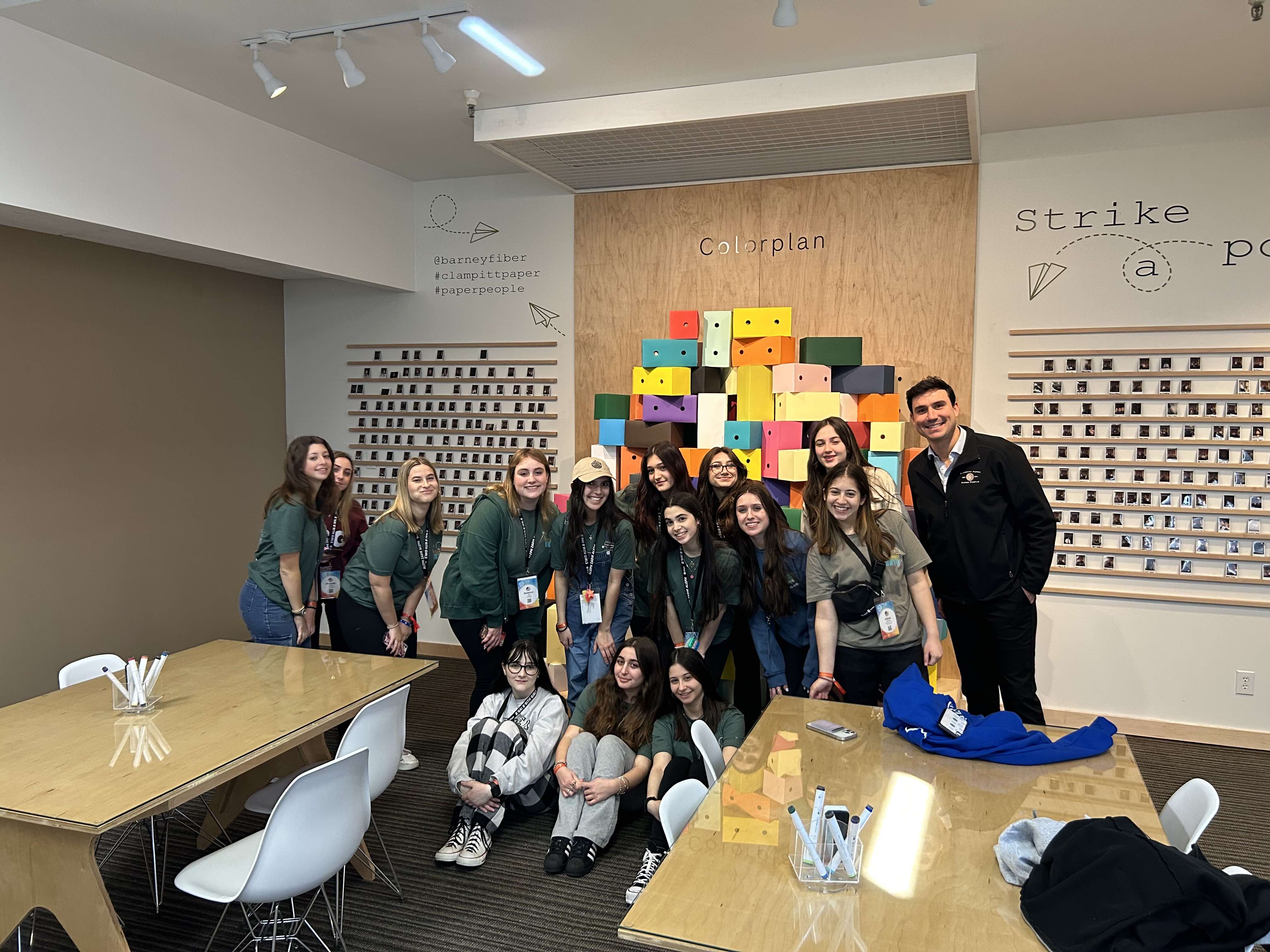 Group of people celebrating on stage