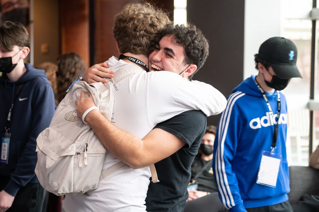 Group of people celebrating on stage
