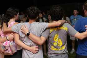 Group of people celebrating on stage