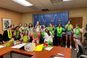 Group of people celebrating on stage
