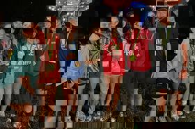 Group of people celebrating on stage