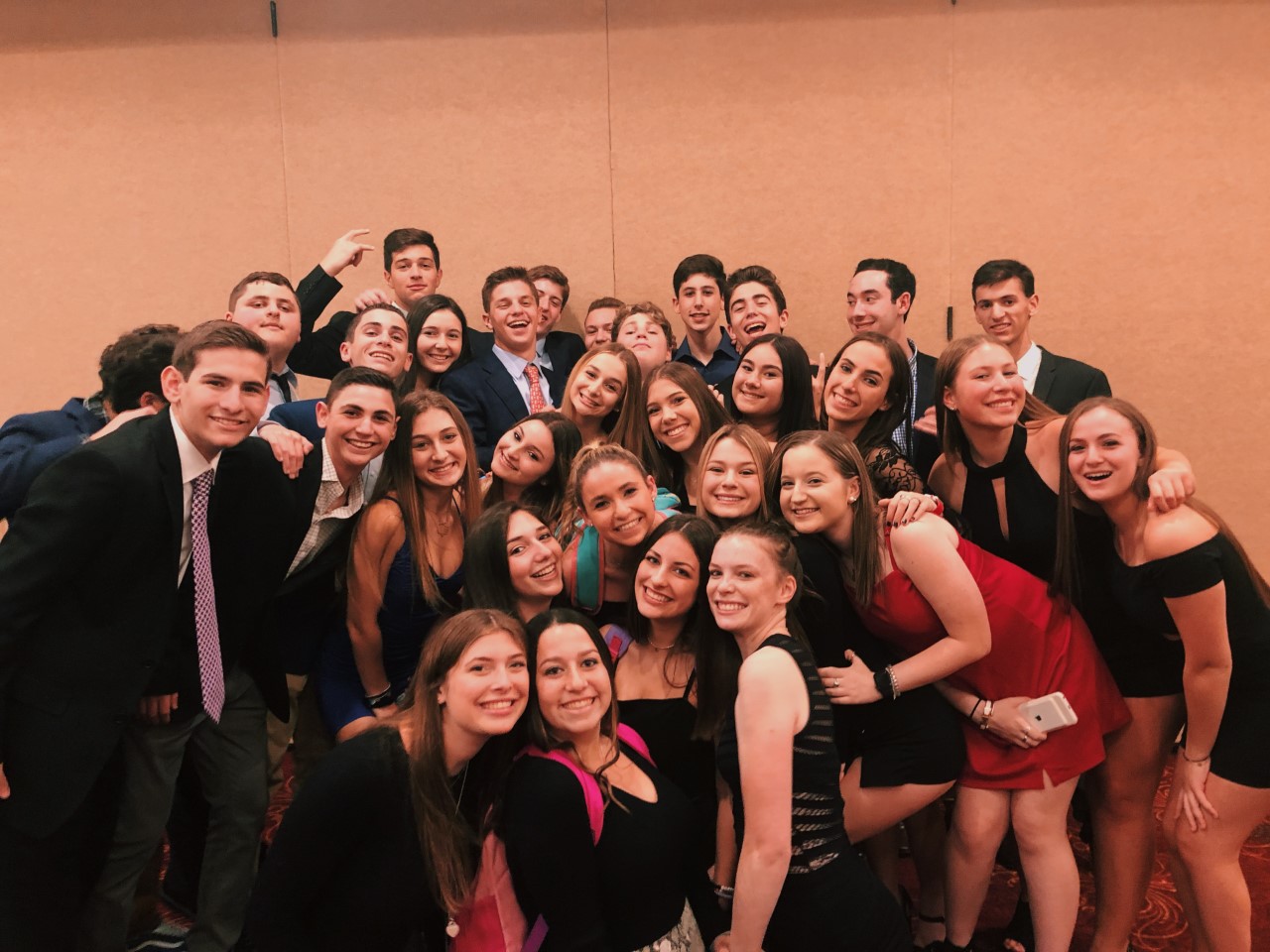 Group of people celebrating on stage