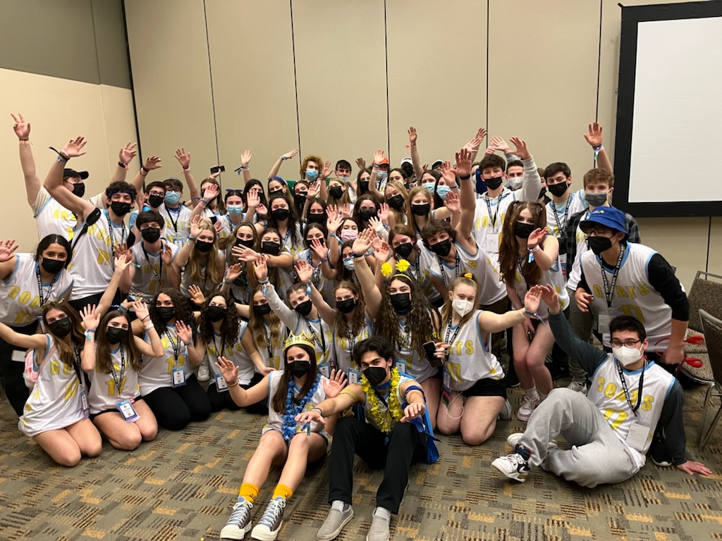 Group of people celebrating on stage