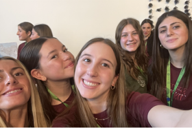 Group of people celebrating on stage