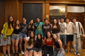 Group of people celebrating on stage