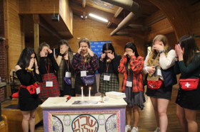 Group of people celebrating on stage