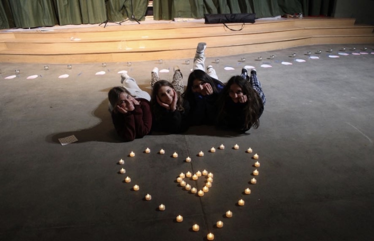 Group of people celebrating on stage