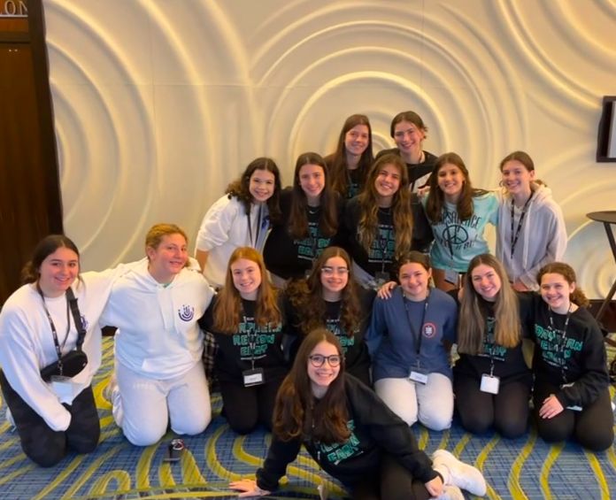 Group of people celebrating on stage