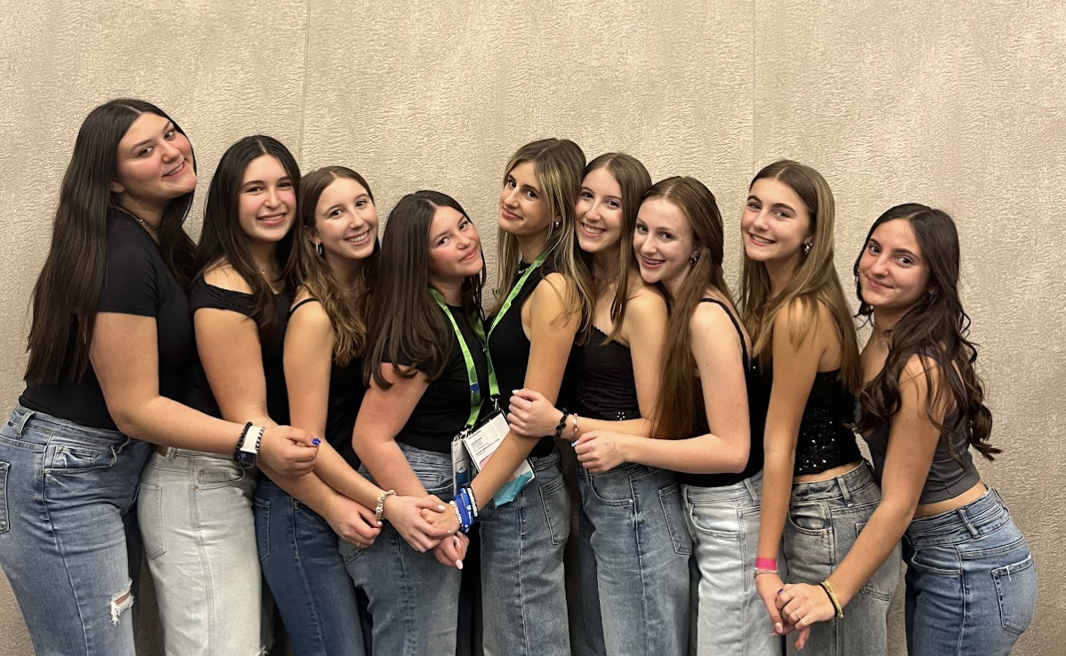 Group of people celebrating on stage