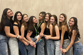 Group of people celebrating on stage