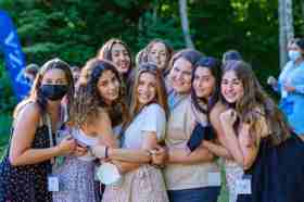 Group of people celebrating on stage