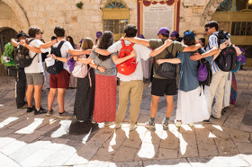 Group of people celebrating on stage