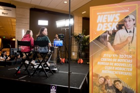 Group of people celebrating on stage