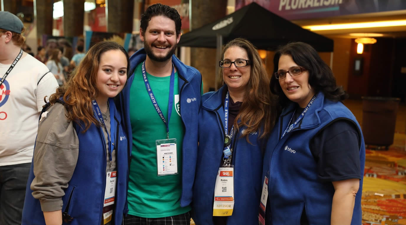 Group of people celebrating on stage