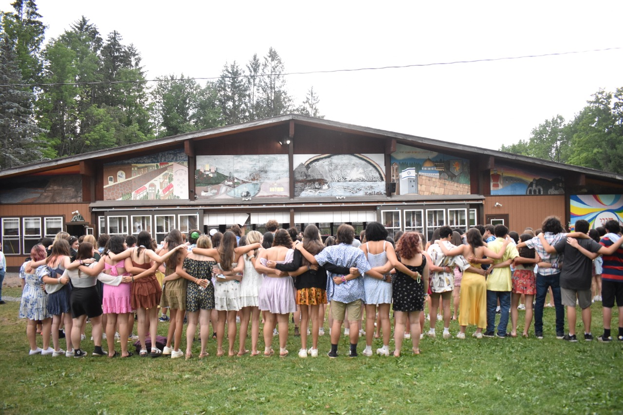 Group of people celebrating on stage