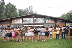 Group of people celebrating on stage