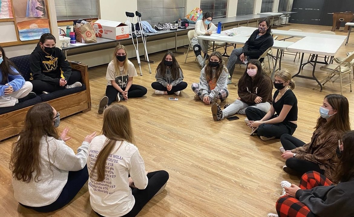 Group of people celebrating on stage