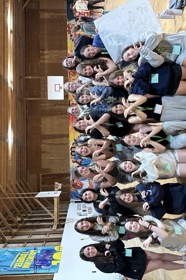 Group of people celebrating on stage