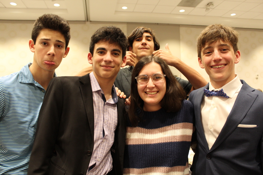 Group of people celebrating on stage