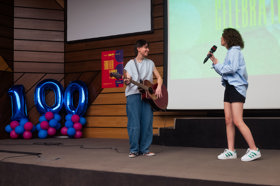 Group of people celebrating on stage