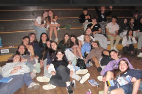 Group of people celebrating on stage